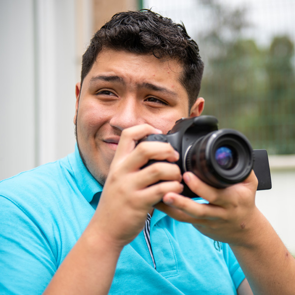 A person taking a pictures with a camera