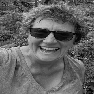 Headshot of Cath, speech and language therapist and autism lead at Aspire Support.